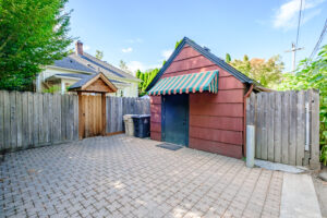 Paved alley behind the cottage with private off-street parking for one car in Corvallis