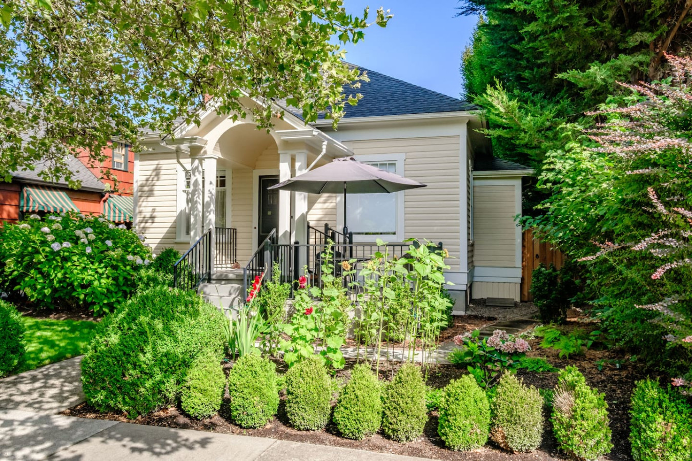 The quiet, tree-shaded Corvallis street outside Campus Cottage, within walking distance of OSU and downtown